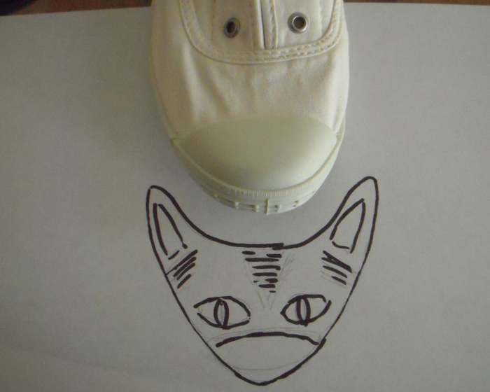 Draw your design on paper first. I drew over my pencil design with pen so that it would be more visible for photo purposes.