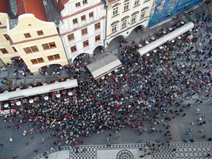 A view from the top of the famous clock tower. Crowds gather to watch the saints make their appearance on the hour