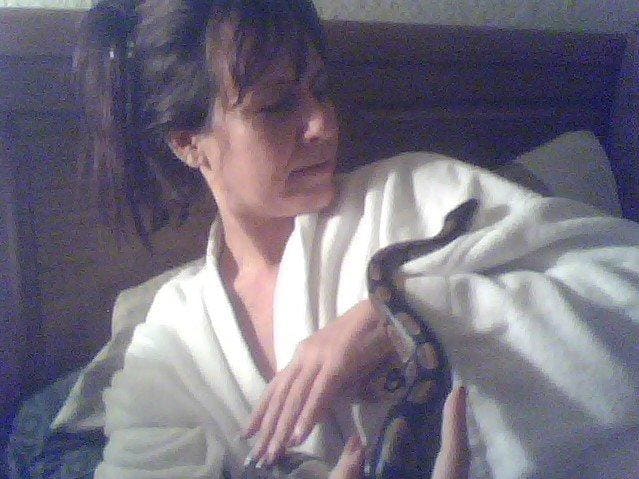 Here I am enjoying the company of my daughter's snake, Kimbo Slice. He found me just as fascinating as I found him.