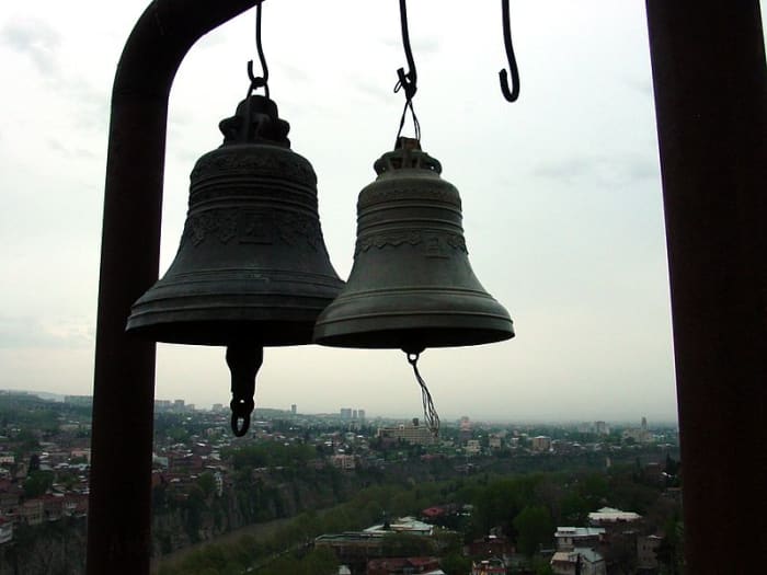 Poe experiments with onomatopoeia, using the sounds of various bells to create mood in his poem "Bells."