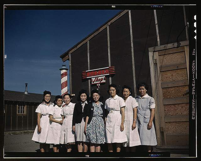 Women in front of barber shop at Tule Lake Relocation Center.