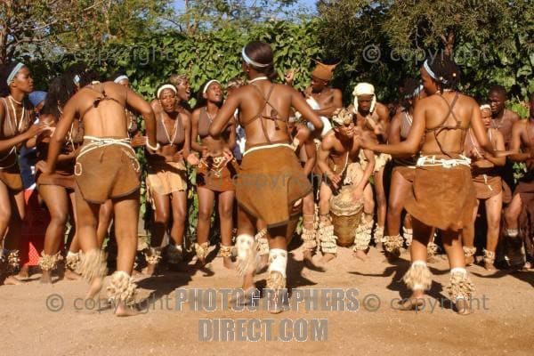 Batswana Boys and girls, dressed in their traditional clothing performing their customary/traditional dance