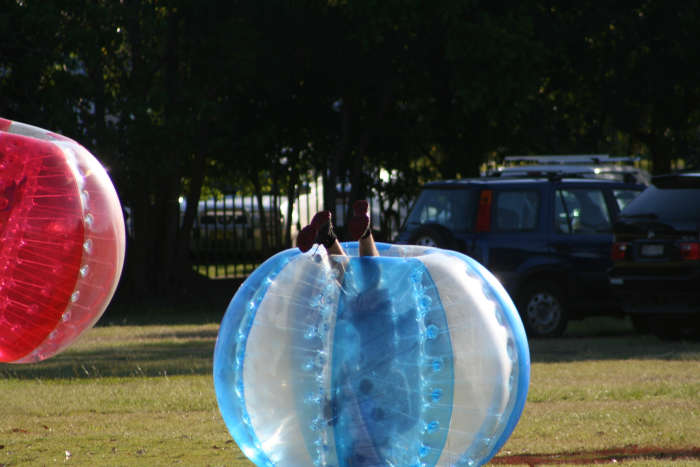 One of the tactics for slowing the opposition in a bubble soccer game is to strategically bump a player so they roll and get stuck upside down. lol.