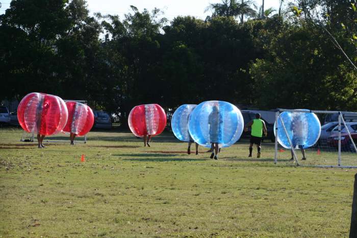 Until recently, bubble suits were made clear and the only way to spot a team member was to look for their team jersey. Trying to identify team mates through two bubble suits (yours and theirs) is difficult. Now there's team colours on the bubbles!