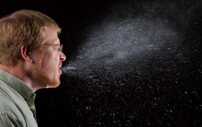 A sneeze captured with a high-speed camera shows just how much and how far contagion can spread if the sneeze is not covered up