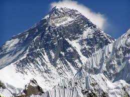 Mt. Everest, the highest mountain on Earth - is situated along the Nepalese-Chinese (Tibet) border and administered by Nepal.