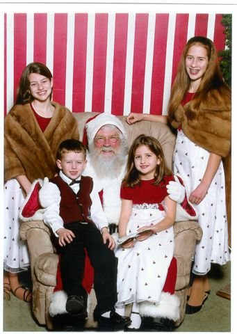 If you want a really beautiful and fashionable Christmas Photo. I cannot think of a better place to really dress up in you vintage Minks, and make a Holiday statement then when young ladies go to see Santa.