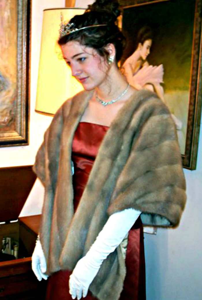 It is OK to go all out if the event is a big vintage formal ball or gala. A tasteful tiara crown and opera length gloves with help you own the floor when you walk in with you entourage.