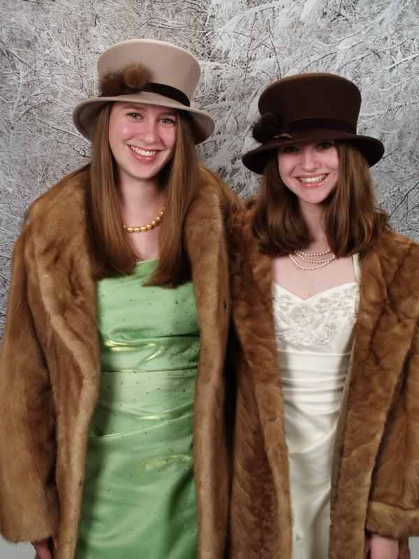 Full length vintage mink coats, and mink car coats look good with hats that are also trimmed with mink. These two hats were made by a furriers and have mink pom pom balls on their rims.