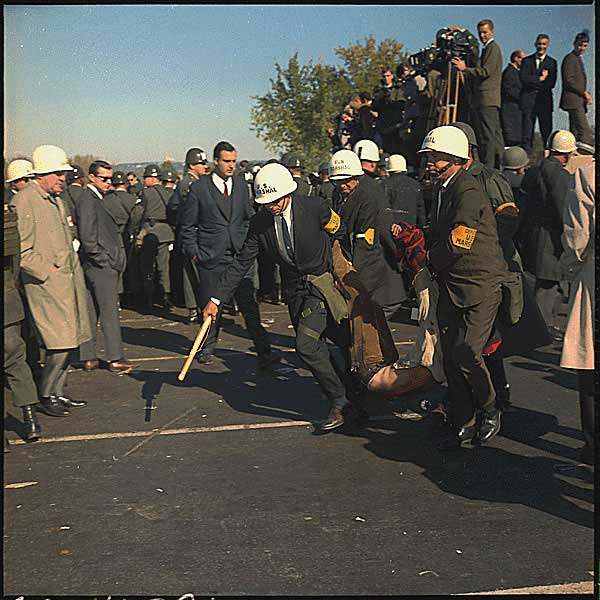 In Washington D.C. An anti-Vietnam demonstration. U.S. Marshals bodily remove one of the protesters during the outbreak of violence at the Pentagon Building, October 1967.