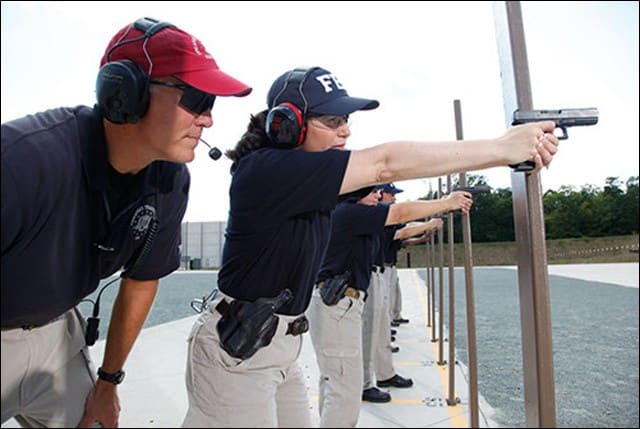 Female FBI Agent Practicing Shooting