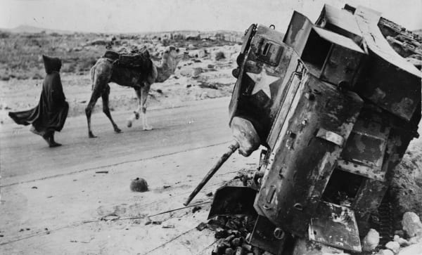 A knocked out American light tank, many troops were left on the field of battle for days.