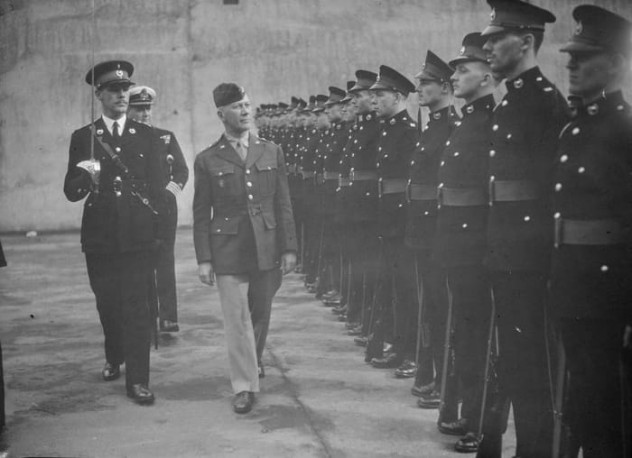 Major General Lloyd Fredendall aboard a British aircraft carrier before the Torch Landings November 1943.