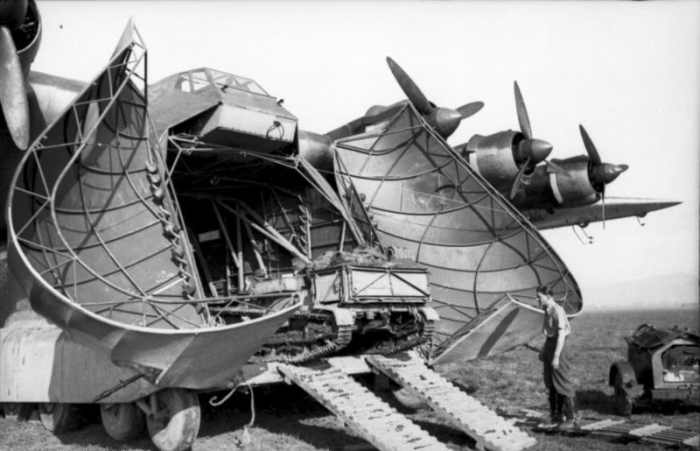 The Messerschmitt Me 323 assault glider loading equipment bound for Tunisia in January 1943.