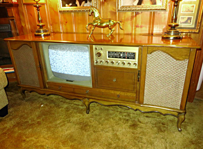 This console is over 55 years old this year 2015, and everything still works, the television, the FM & AM radio, and the Curtis Mathes made turntable.. A true timeless classic.