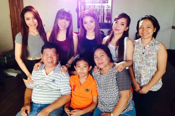 From the right facing the screen, Erlinda Cercado, Elvira, Almira, Irene, Celina, Dominador, and the youngest in the family.
