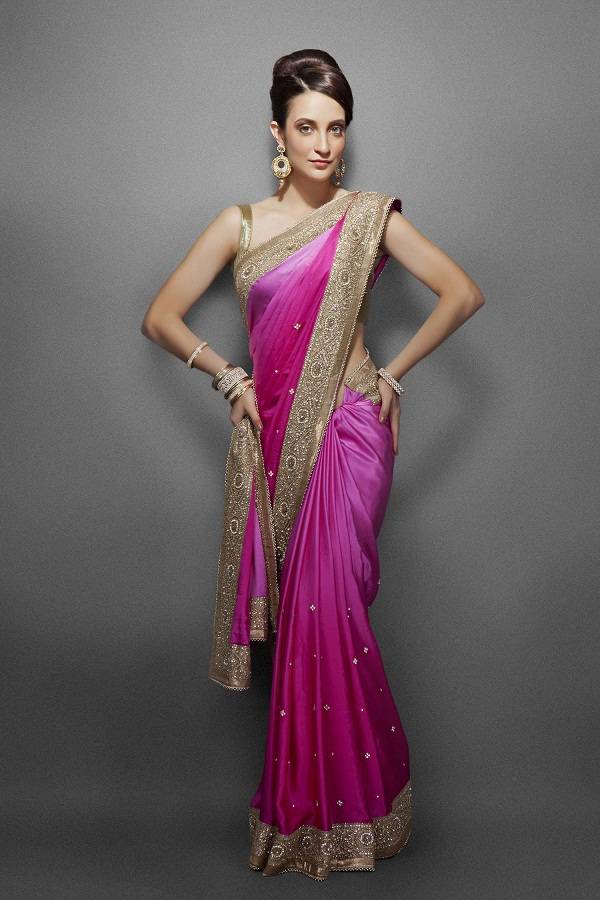 If the saree is to be worn nivi style and the pallu is pleated at the shoulder, it should be pleated narrow as shown in this picture.