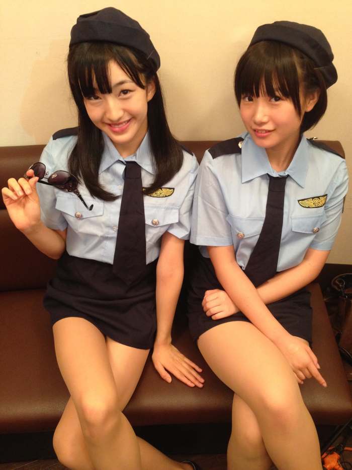 Meru Tashima (left) and Mio Tomonaga (right) look absolutely gorgeous in these police style uniforms!