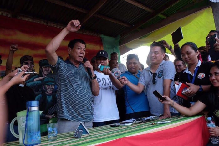 The New People's Army releases its captive Philippine National Police officers to then Mayor Rodrigo Duterte.