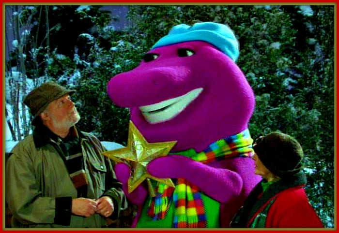 Barney's Christmas Star, 2002, sends Barney and his friends on a mission to find the perfect Christmas star for the top of the tree! Barney and his friends in the holiday spirit, they trim the Christmas tree in the snow covered park.