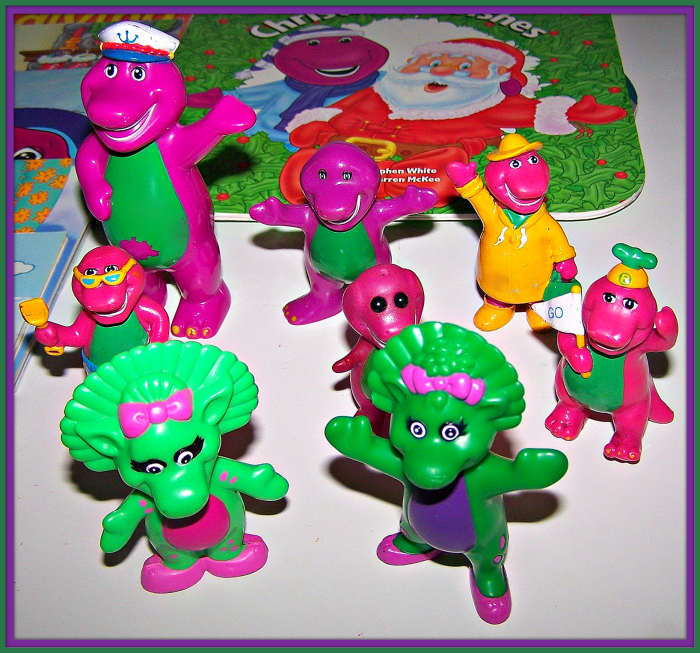 In this group of Barney figures the size ranging is from two inches to four inches, there are six Barney and two Baby Bop. Many children in this era had huge collections proudly displayed on their shelf's during this era ...