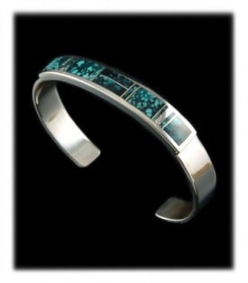 Turquoise and silver inlay cuff bracelet made by Navajo Native American Stanley Manygoats of New Mexico.