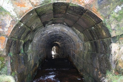 Rosedale Head culvert allowed water courses to flow freely. The infant River Seven sprang from the moor near Reeking Gill