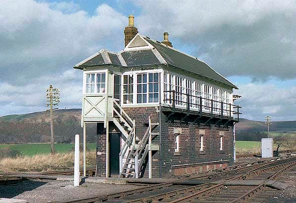 The now demolished Battersby signal cabin - in the background, top picture - newly painted at the time - with its long lever frame that once controlled signalling west towards Ingleby, north to Ayton and east to Kildale with the level crossing.