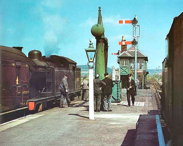 Trains cross at Battersby Station, 1958, before the introduction of diesel multiple units on the route from Middlesbrough to Whitby. in the bay for Middlesbrough, the other for Whitby, both locomotive hauled (Class A8 4-6-2 tank)