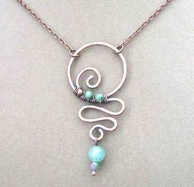 This necklace is a little more advanced, but in my opinion, once you learn how to work with wire, it would be fairly simple to make with the right supplies