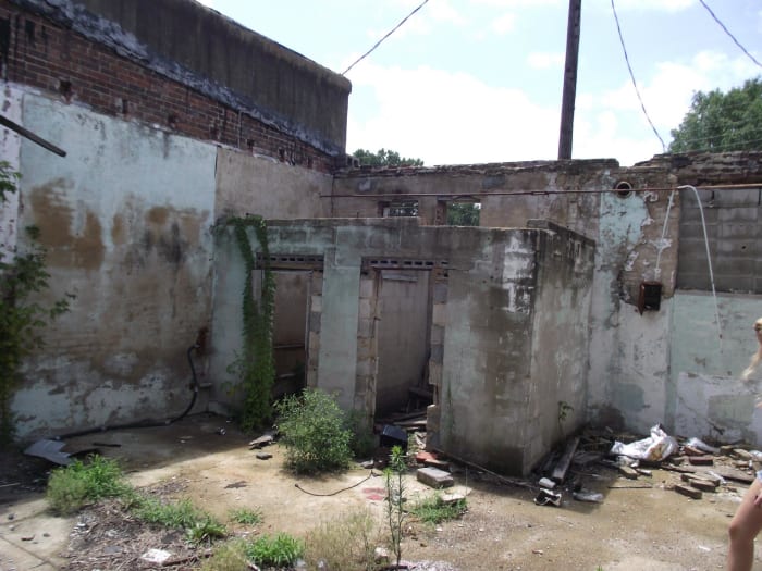 Original New Houlka City Hall and Jail ruins - The two doorways in the photo were jail cells. 2012