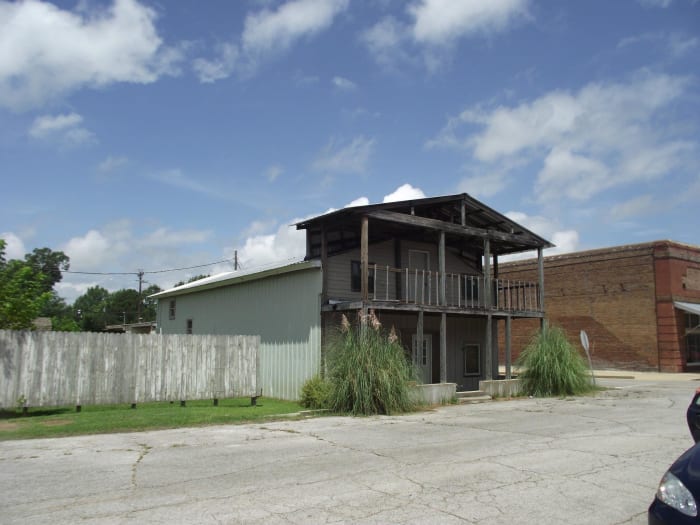 This building has been changed greatly from its earlier days. It was one of the buildings rolled on logs, and pulled by Oxen from Old Houlka to New Houlka.