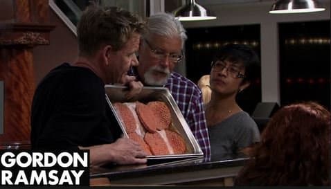 Brent MacDonald is being schooled by Gordon Ramsay on the difference between a fresh burger and frozen burger.
