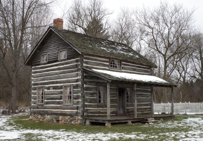 Darius Moon's authentic log cabin, now at Woldumar Nature Center. Here he was raised with eight other siblings