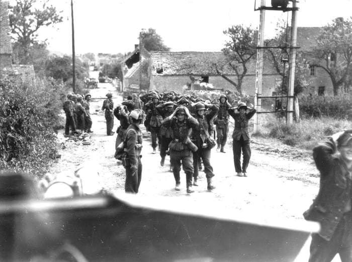 German troops surrender in France during summer of 1944 as Allied forces break out of the Normandy bridgehead.