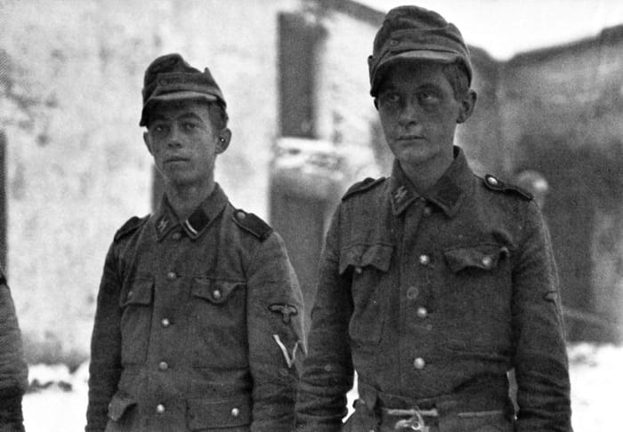 Captured Soldiers of the 12th SS Panzer Division "Hitler Jugend" during the Battle of the Bulge.