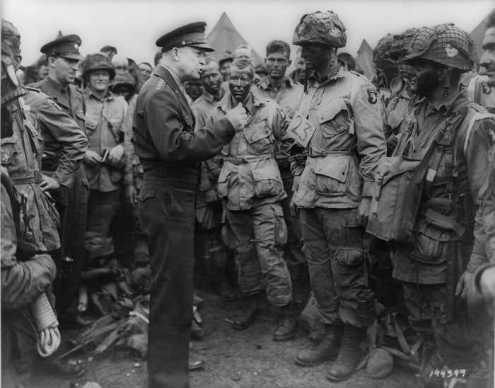 Eisenhower speaks with men of the 502nd Parachute Infantry Regiment, part of the 101st Airborne Division, on June 5, 1944, the day before the Allied Forces landed on the Normandy Beaches.