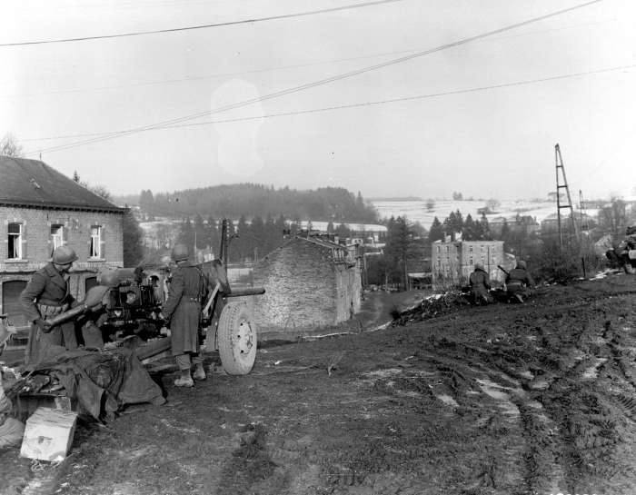 American 3-inch M5 anti-tank gun in Vielsalm, Belgium, December 23, 1944, near Saint-Vith another vital crossroad in the Ardennes. Note the gun is sited on the road below.
