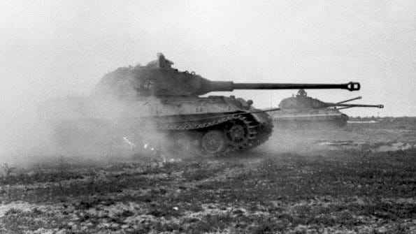 The German Tiger Mark II King Tiger in action near the beaches of Normandy June 1944. Its lack of mobility would cost the German army any chance of victory in the Battle of the Bulge.
