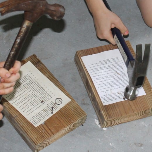 Nailing copies of the "Ninety-five Theses" was one of the activities we did this week during our History Morning Basket & Activities time on the Protestant Reformation.