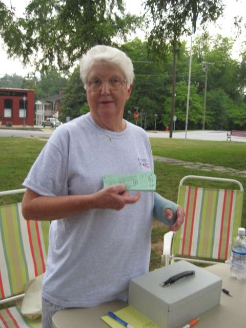 Friends of the Park - Even with a broken arm, Caroline is working hard promoting Freedom Fest on July 2