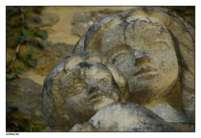The sculpture looked more like that of an elder sister attempting to contain her baby brother than that of a mother and her child.