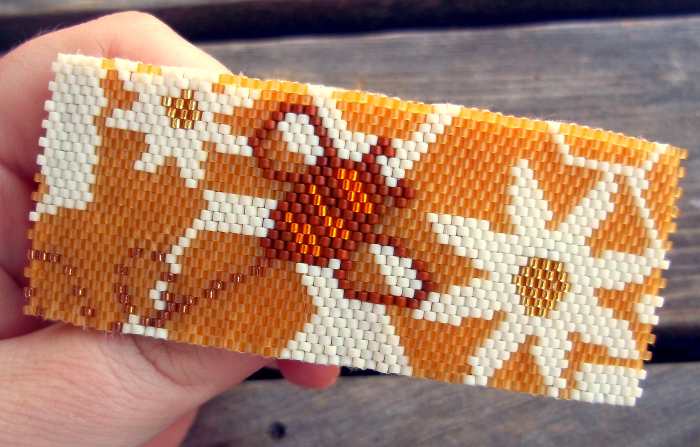 The same techniques used for a peyote stitch beaded cuff bracelet can also be used to create other jewelry and accessories like this barrette. This has a peyote face and felt backing for a smooth, durable finish.