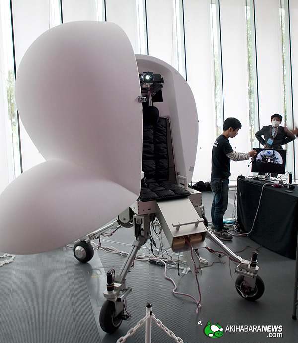 Developed by the Iwata-Yano Laboratory at Tsukuba University, "The Media Vehicle is a personal virtual cocoon where you get spherical display projecting videos and image feed shots with a camera, providing rider minimum movement sensation for overall
