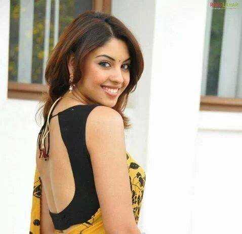 A simple black blouse with deep spread out U-shaped back neck, with strings keeping the blouse together. This sleeveless design for summer wear is ideal for ultimate comfort and style.