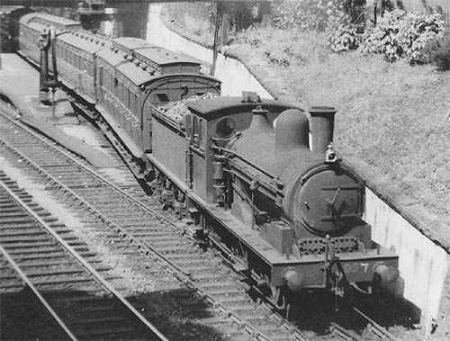 With a fine rake of North Eastern vintage David Bain suburban clerestory stock, this is another LNER-numbered veteran, No. 997 at Beamish well before preservation days