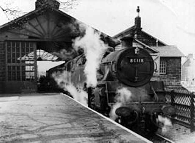 Guisborough station on the eastern side of Cleveland, North Yorkshire - B R Class 4MT 2-6-4 80118 is ready to depart for Whitby via the coast line
