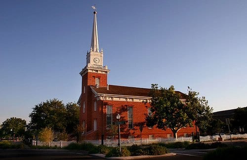 Made of red sandstone the St. George Tabernacle has been restored to look like the original building when it was completed in 1876.