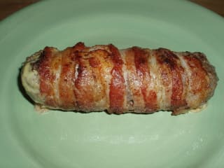 Here the cheese and the all beef hot dog have been wrapped with hamburger and then wrapped in bacon. Take the time to put them together this way for the ultimate hamburger.