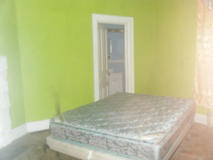 The bedroom of 94 year old Sherry Crammer. She was beaten and stabbed to death in this bedroom but her body was never found. What happened to the body of the 94 year old woman.